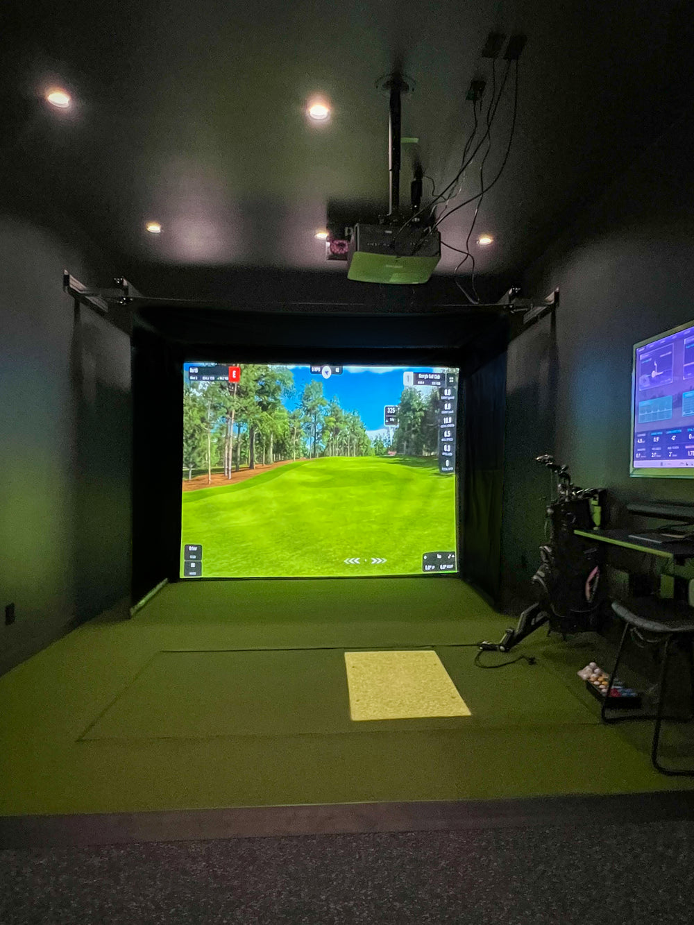 The SportScreen Golf Studio Vanish 11 Retractable Golf Simulator Enclosure