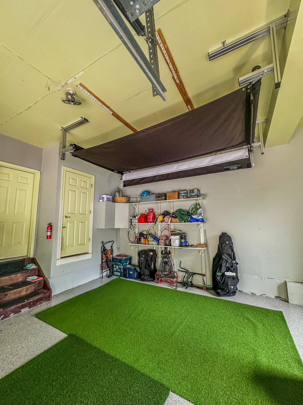 The SportScreen Golf Studio Vanish 11 Retractable Golf Simulator Enclosure